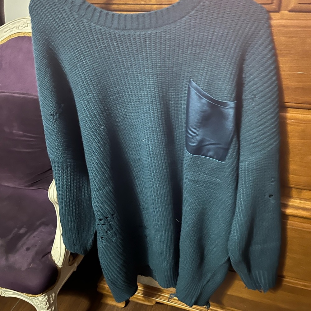Teal sweater from Torrid.